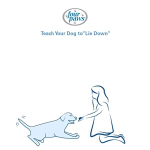 girl giving treat to dog lying down 