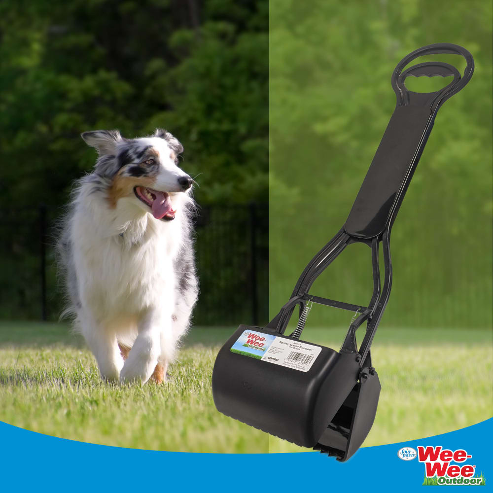 045663182304-four-paws-allens-spring-action-dog-scooper-for-grass-black-regular-lifestyle