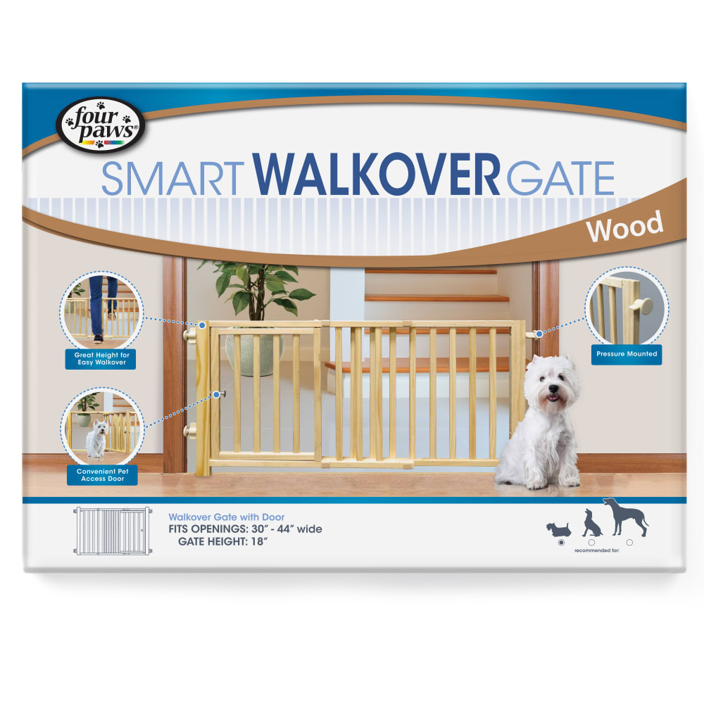 Front view of Four Paws Walkover Wood Dog Gate With Door 44in in packaging